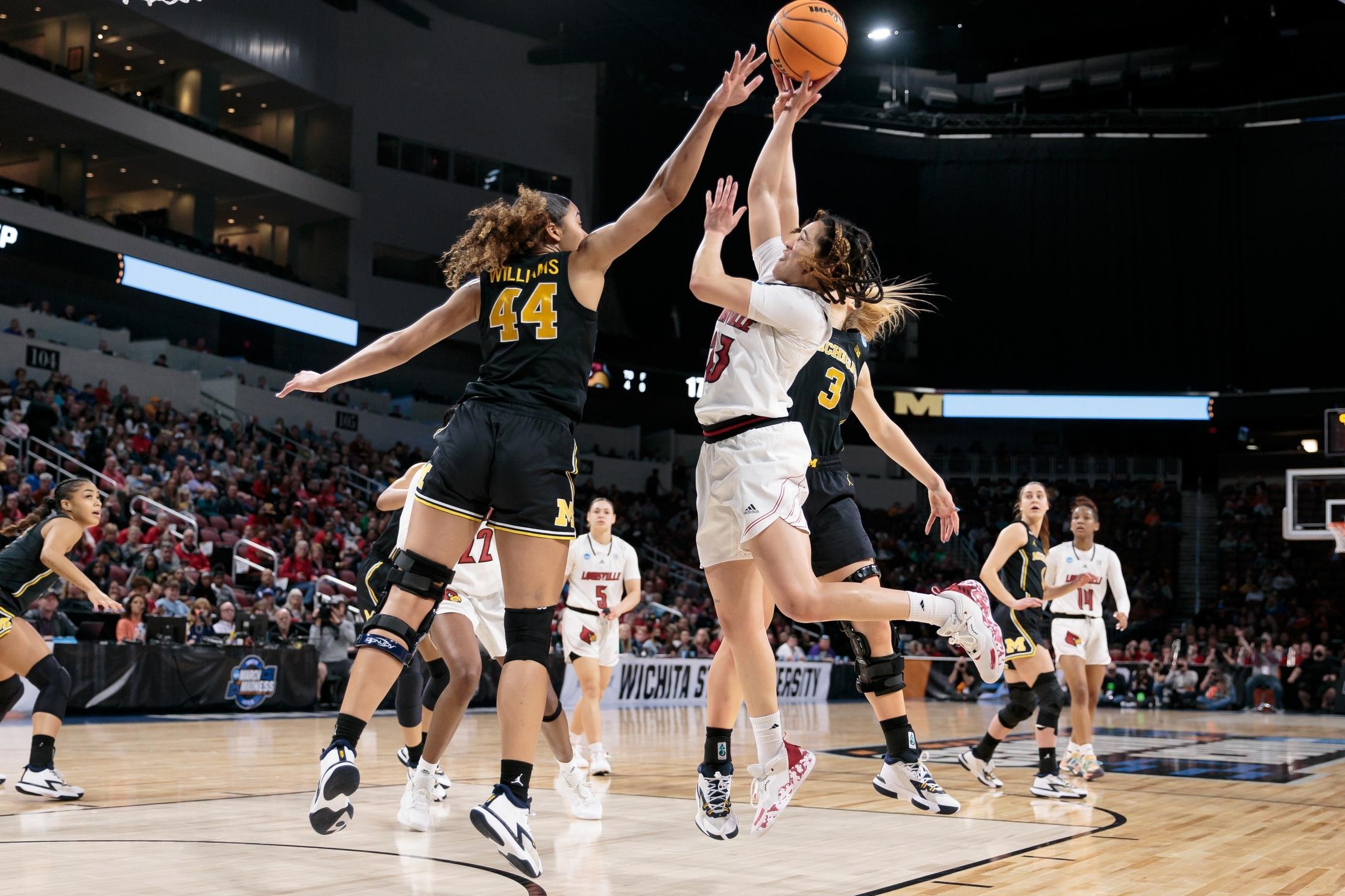 Louisville plays Michigan