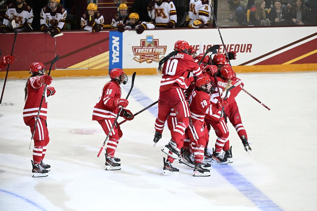 Wisconsin women's hockey celebrates against Minnesota
