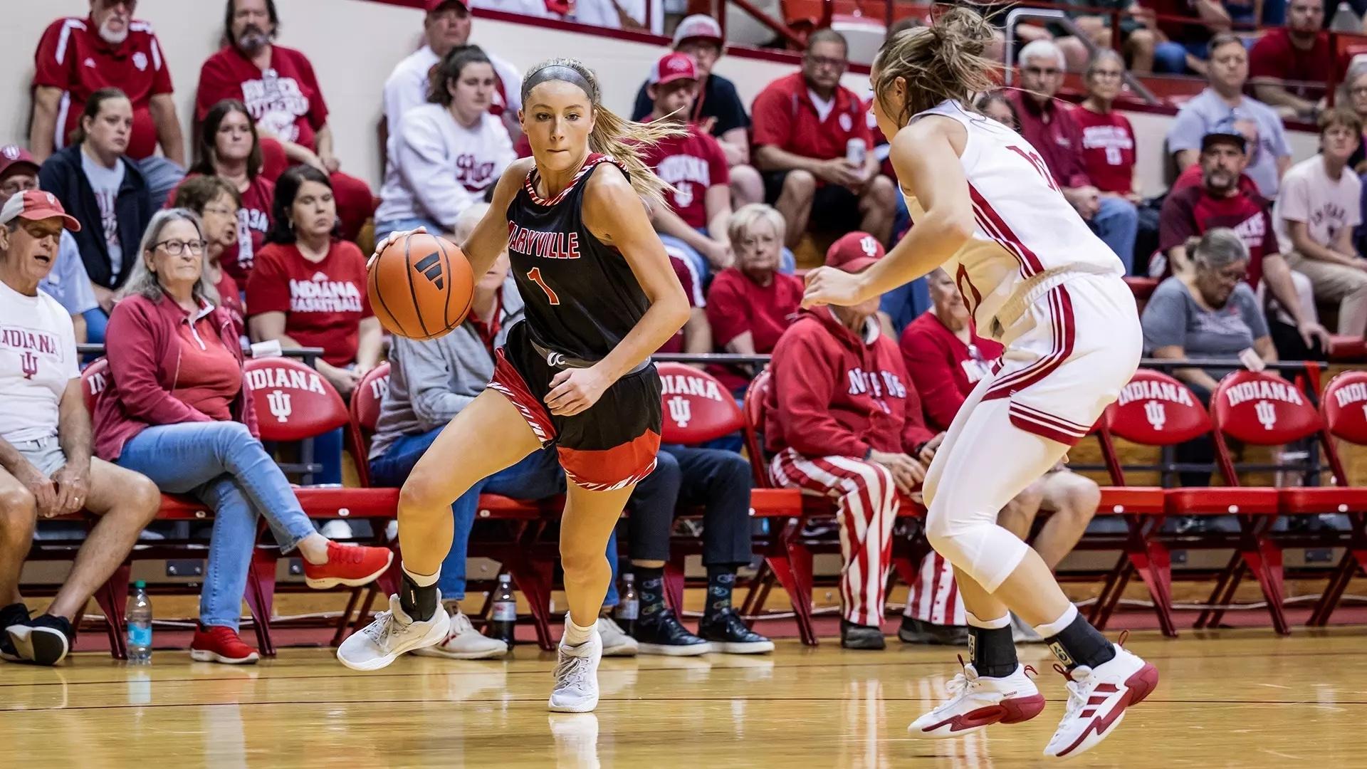 Gracie Stugart drives to the hole for Maryville (MO) women's basketball. 