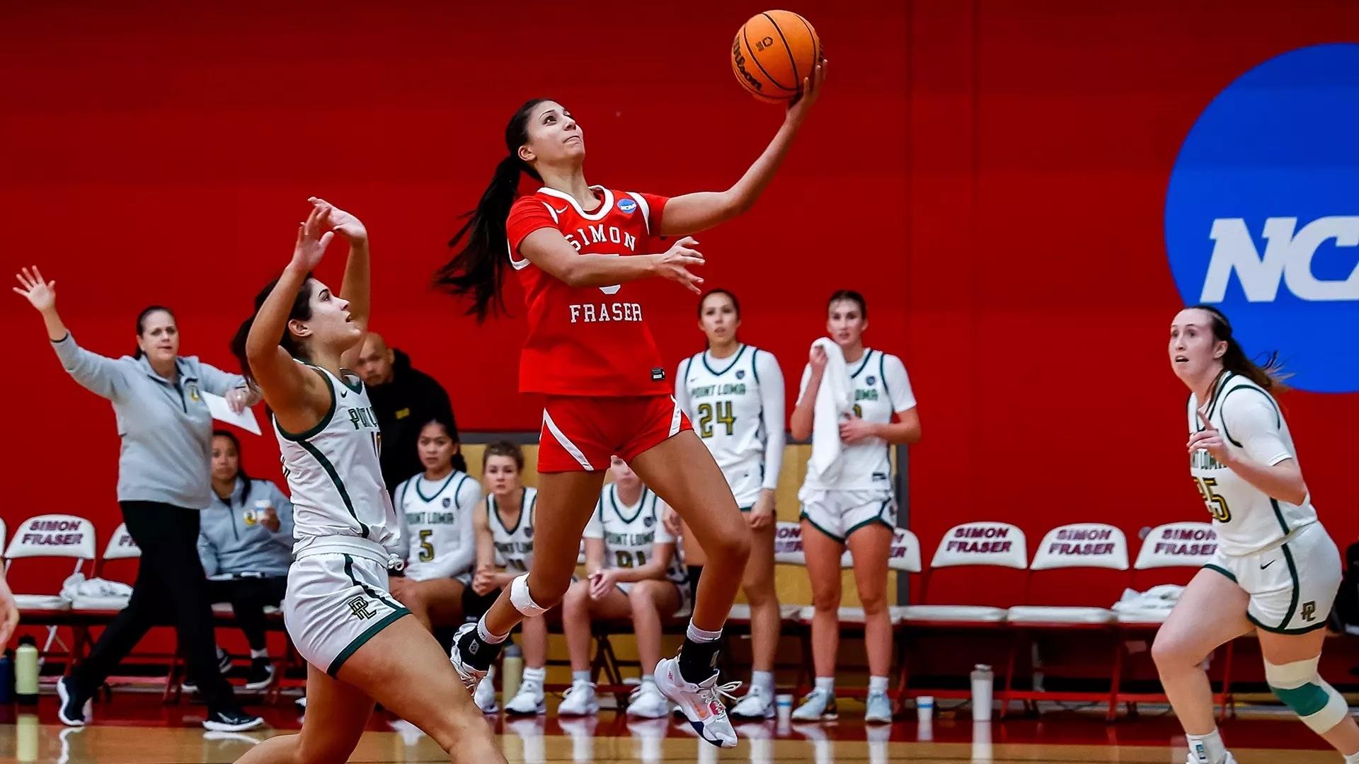 Sophia Wisotzki goes to the basket for Simon Fraser.