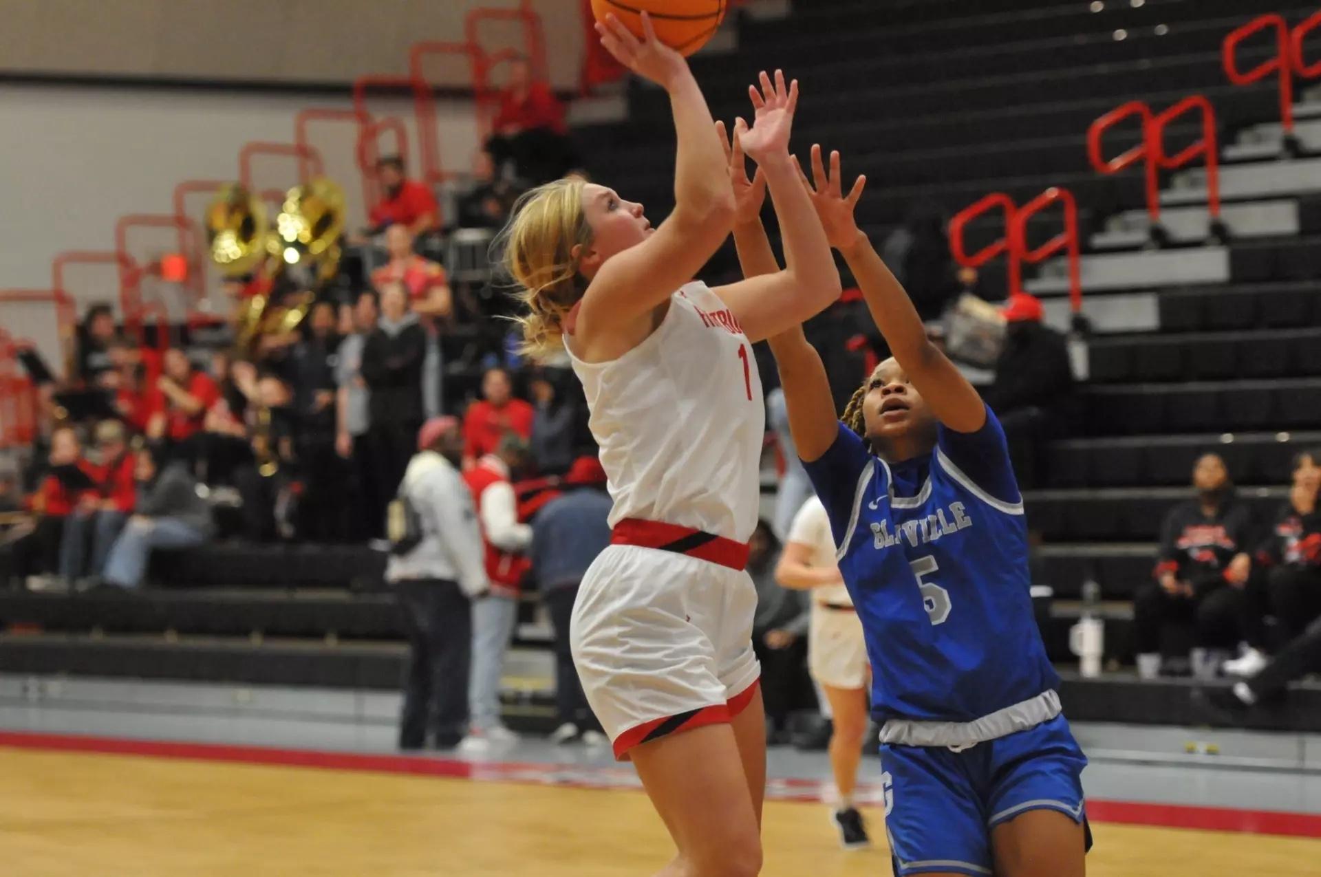 Emilee Weakley scores one her DII women's basketball leading points. 