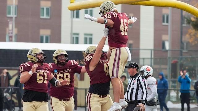 Kutztown celebrates advancing to the DII football semifinals. 