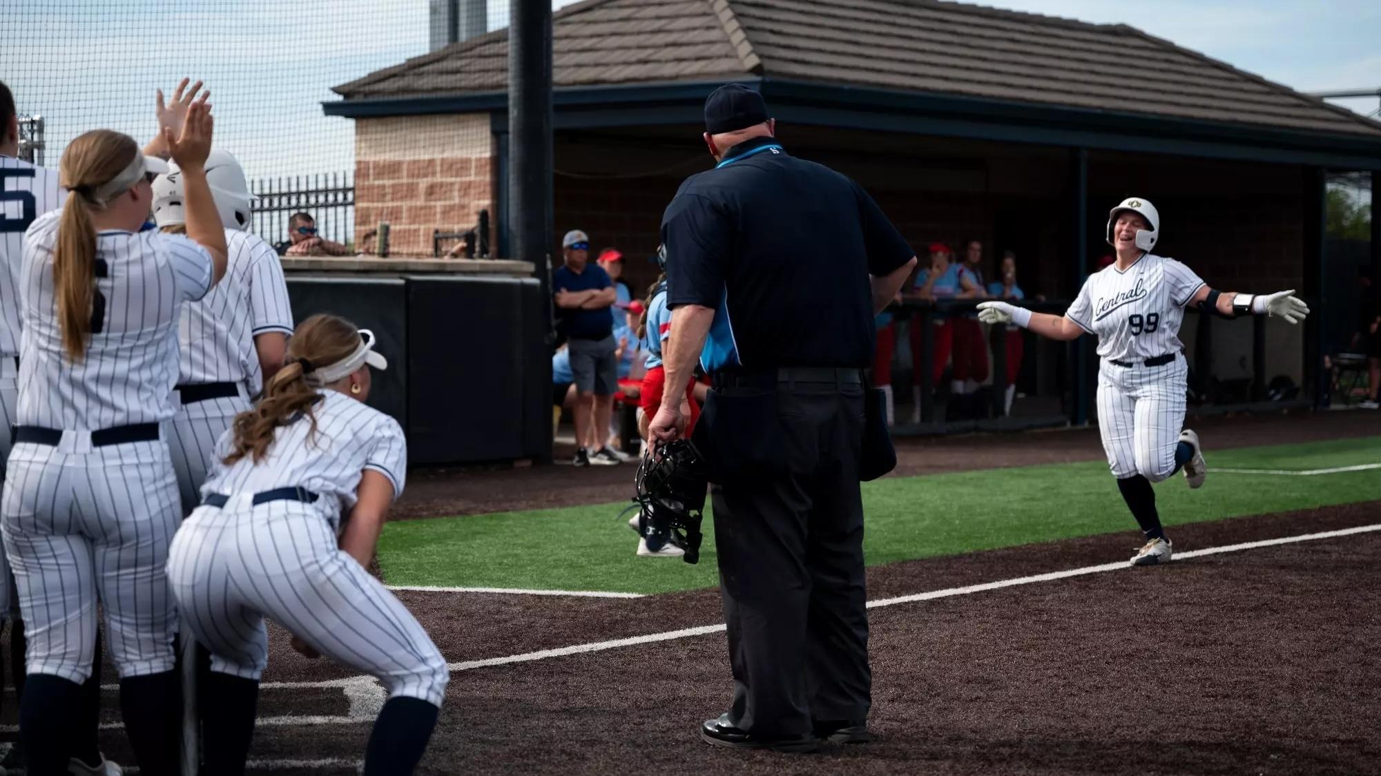 Terin Ritz greets teammates as she comes home after another home run.